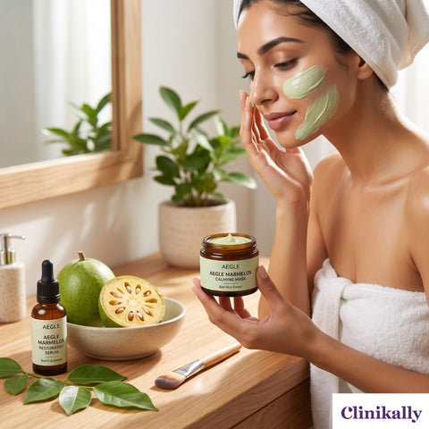 Woman applying Aegle Marmelos face mask with bael fruit