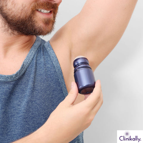 Applying roll-on deodorant
