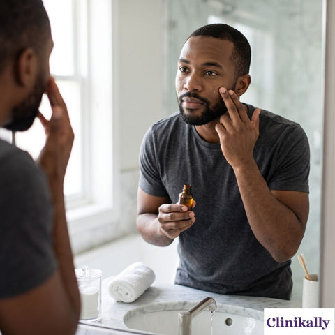 men applying face serum correctly