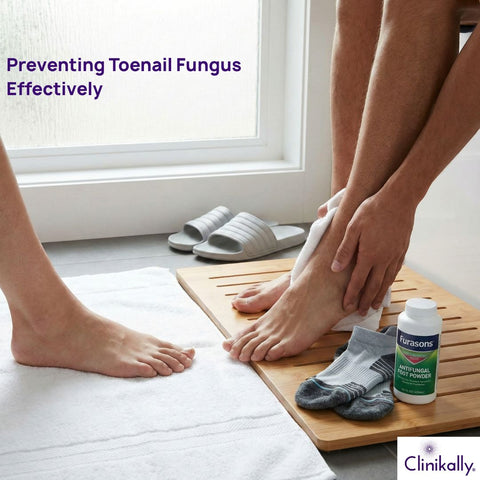 Person wiping his foot with a towel