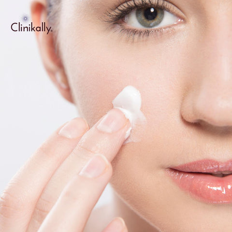 Close-up of shea butter cream applied to facial skin
