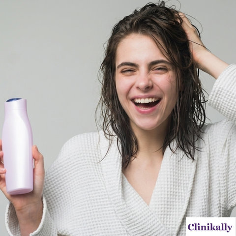 Woman using shampoo for thinning hair